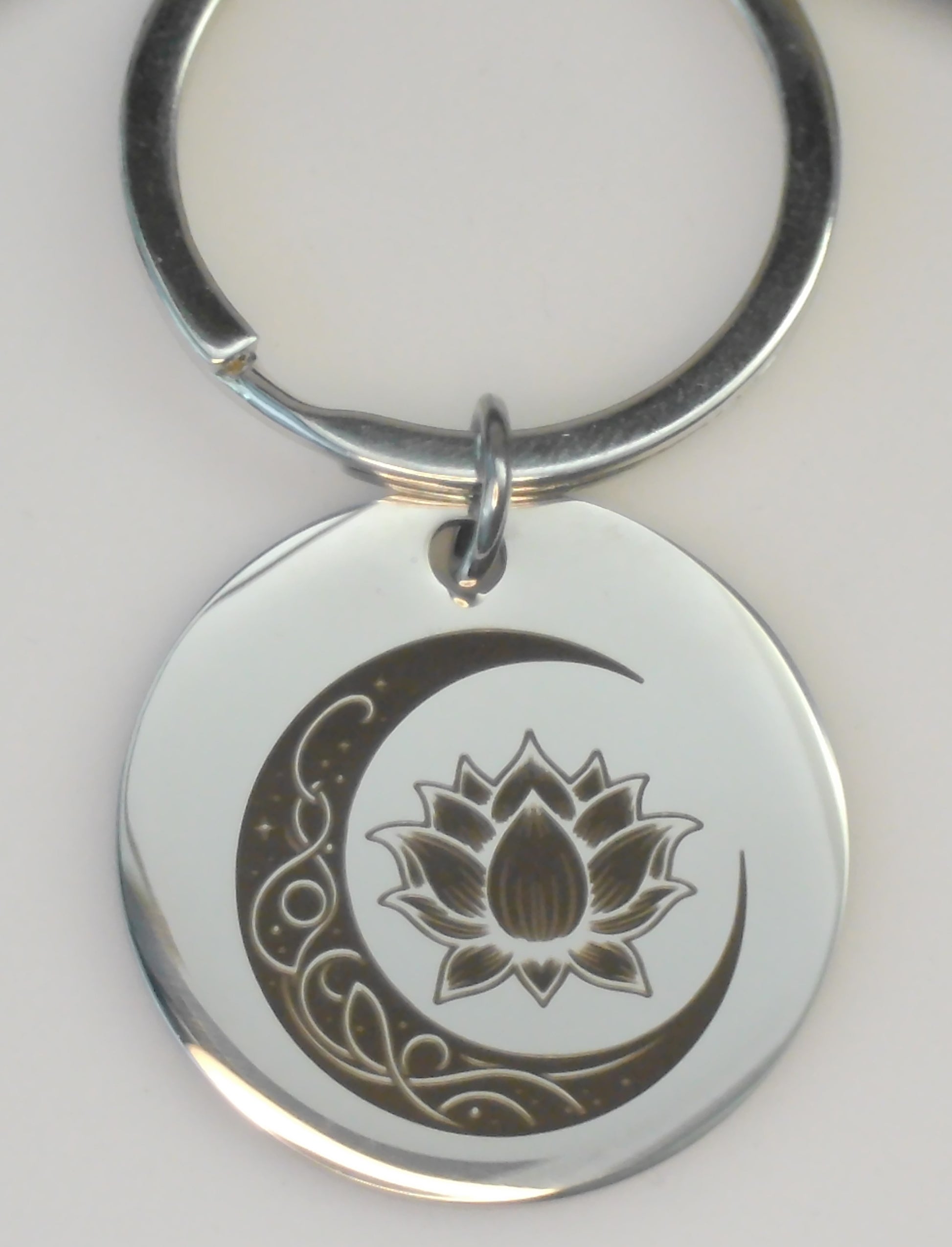porte clés en acier inoxydable argent gravure marquage couleur brun par technologie laser mopa