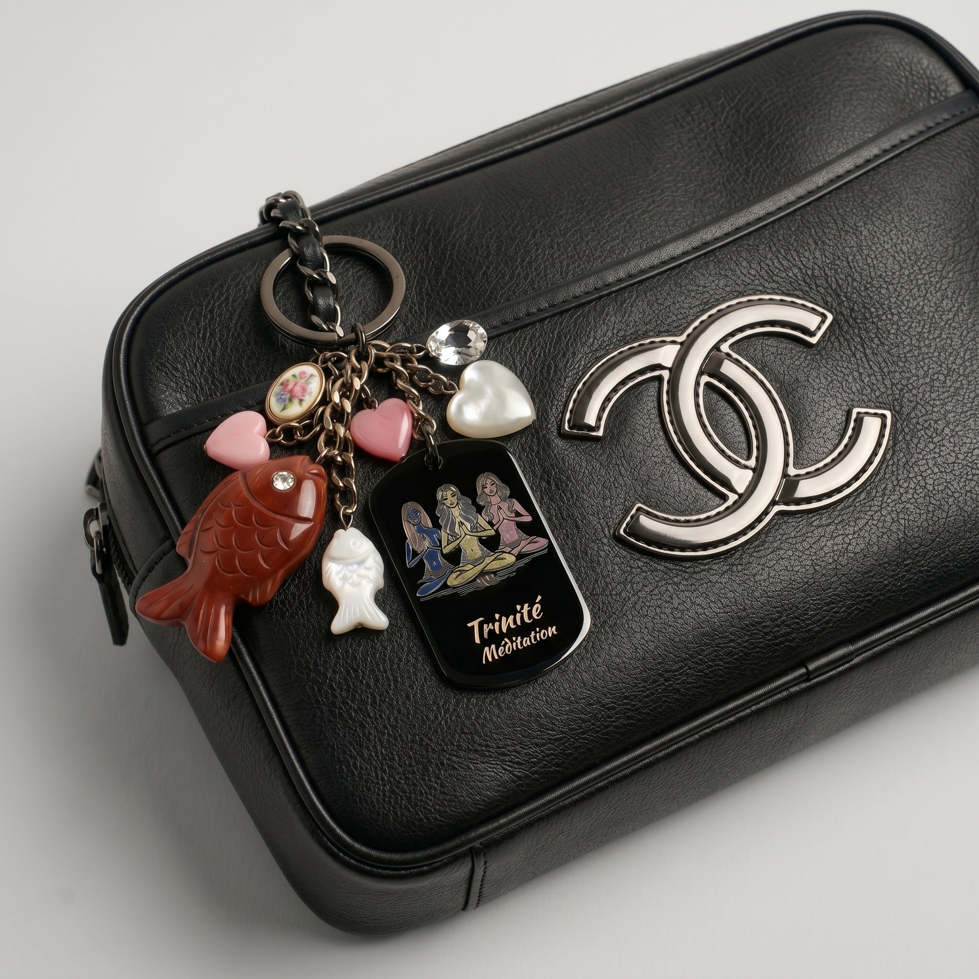 Porte-clefs Bijoux de sac Accessoire de sac noir en acier inoxydable gravé couleur par technologie laser MOPA