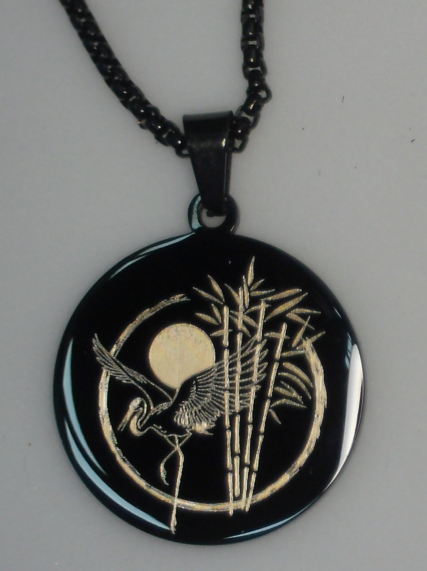 Grue japonaise dans cercle Zen en Or